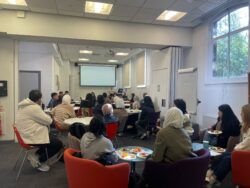 Language@Leeds PGRs talking over lunch.